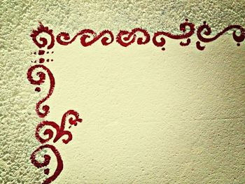 Close-up of heart shape on wall