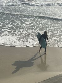 Full length of woman on beach