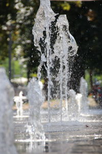 Water splashing in fountain at park