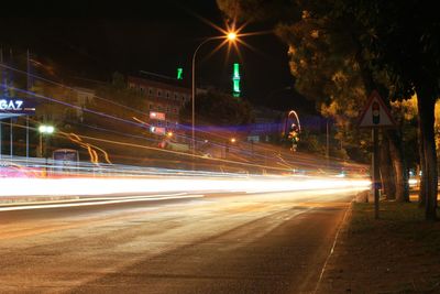 Light trails on street at night