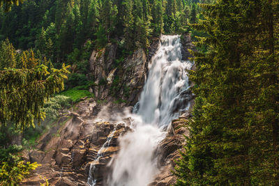 View of waterfall in forest