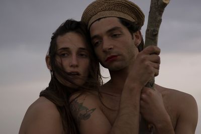 Portrait of young couple outdoors