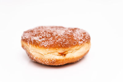 Close-up of cake on white background