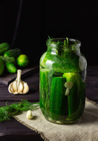 Close-up of juice in glass jar on table