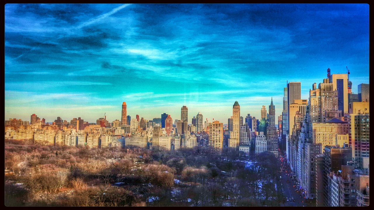 building exterior, city, architecture, transfer print, built structure, cityscape, sky, auto post production filter, skyscraper, cloud - sky, blue, cloud, crowded, tall - high, tower, modern, city life, residential building, residential district, panoramic