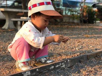 Close-up of cute boy playing in playground