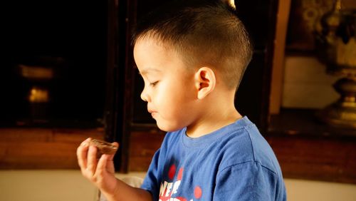 Close-up of boy at home