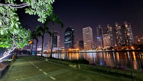 Illuminated buildings in city at night