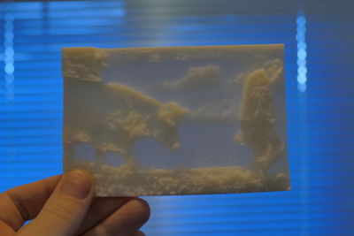 Close-up of hand holding ice cream