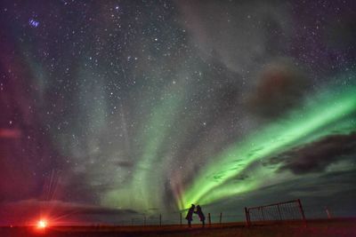 Man against sky at night