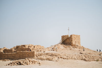 Ruins of building against clear sky