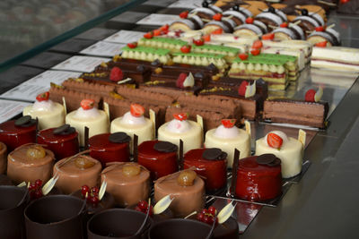 High angle view of various desserts for sale in store