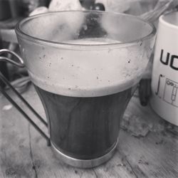 Close-up of coffee cup on table