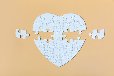 Close-up of heart shape over white background