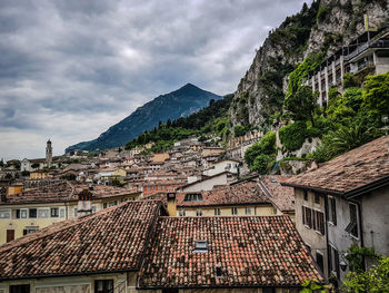 Houses in town against sky