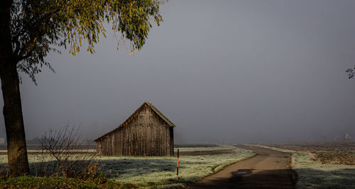 House on field against sky