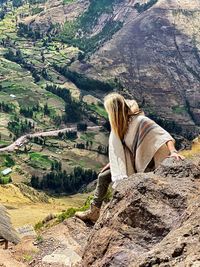 Rear view of woman looking at mountain