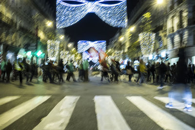 People in city at night