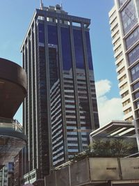 Low angle view of skyscrapers against sky