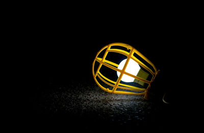 Close-up of illuminated yellow light