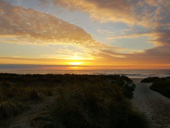 Scenic view of sea against sky during sunset