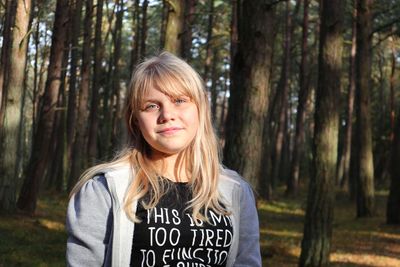 Portrait of a teenage girl in forest