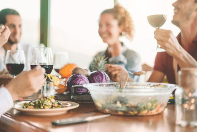 Group of people in drinking glass on table