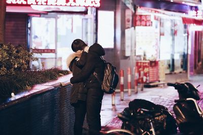 Full length of man in snow at night