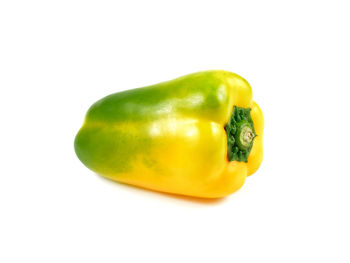 Close-up of yellow bell pepper against white background