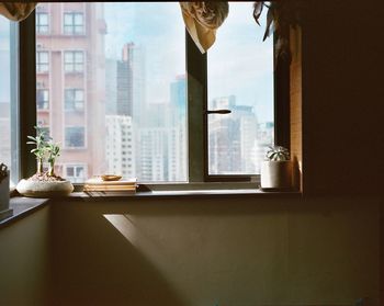 Close-up of window on table at home