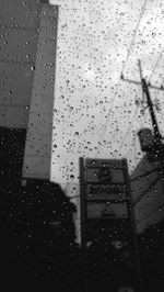 Raindrops on glass window during rainy season
