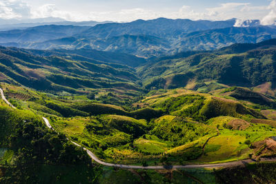 Natural reservoir dam in the valley in thailand aerial view from drone rain season at evening