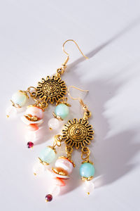 High angle view of earrings on table