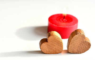 Close-up of cupcakes on table against white background