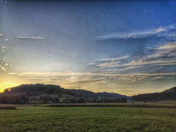 Scenic view of landscape against sky during sunset