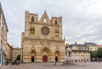 Facade of historic building against sky