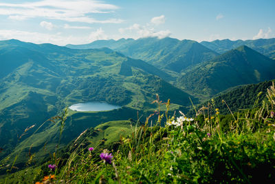 Lake in the mountains of chechnya. the mountains and the lake in the mountains are visible.