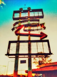 Low angle view of illuminated building against sky