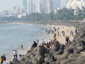 High angle view of people at beach in city