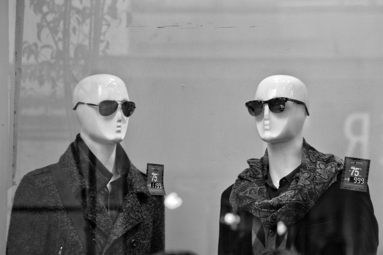 human representation, representation, mannequin, female likeness, store, retail display, indoors, fashion, retail, male likeness, clothing, shopping, window, front view, no people, store window, business, display, reflection, for sale, sale, consumerism
