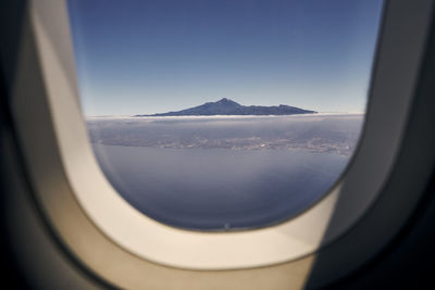 View of mountains from airplane window