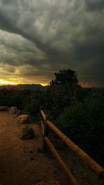 Scenic view of landscape against cloudy sky