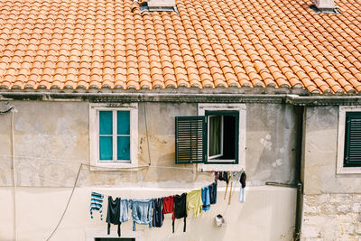 Clothes drying on old building