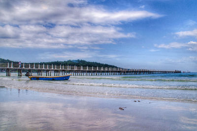 Scenic view of beach against sky