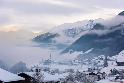 Scenic view of snowcapped mountains against sky