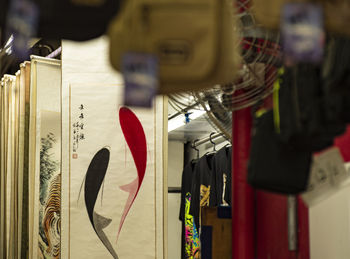 Close-up of clothes hanging on display at store