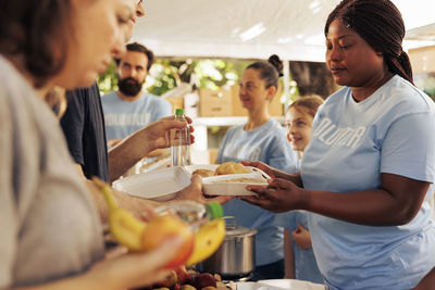 Portrait of woman preparing food at restaurant