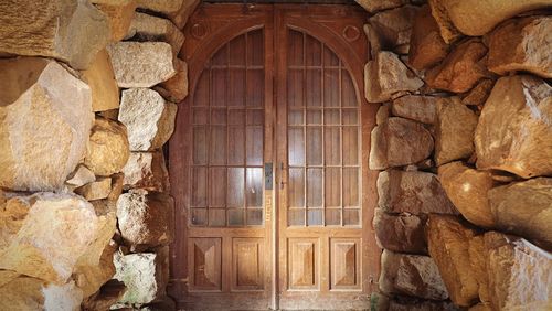 Closed wooden door of building