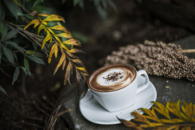 Close-up of coffee cup on table