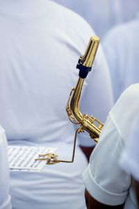 Close-up of man holding musical instrument 